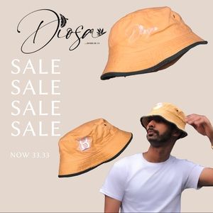 Unisex Yellow bucket hat Yellow & Green trim and designed w/a dual logo.